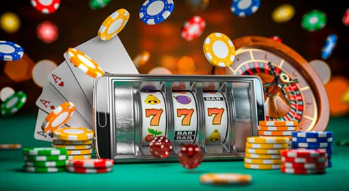 Smartphone with slots, chips, roulette and cards on a gaming table